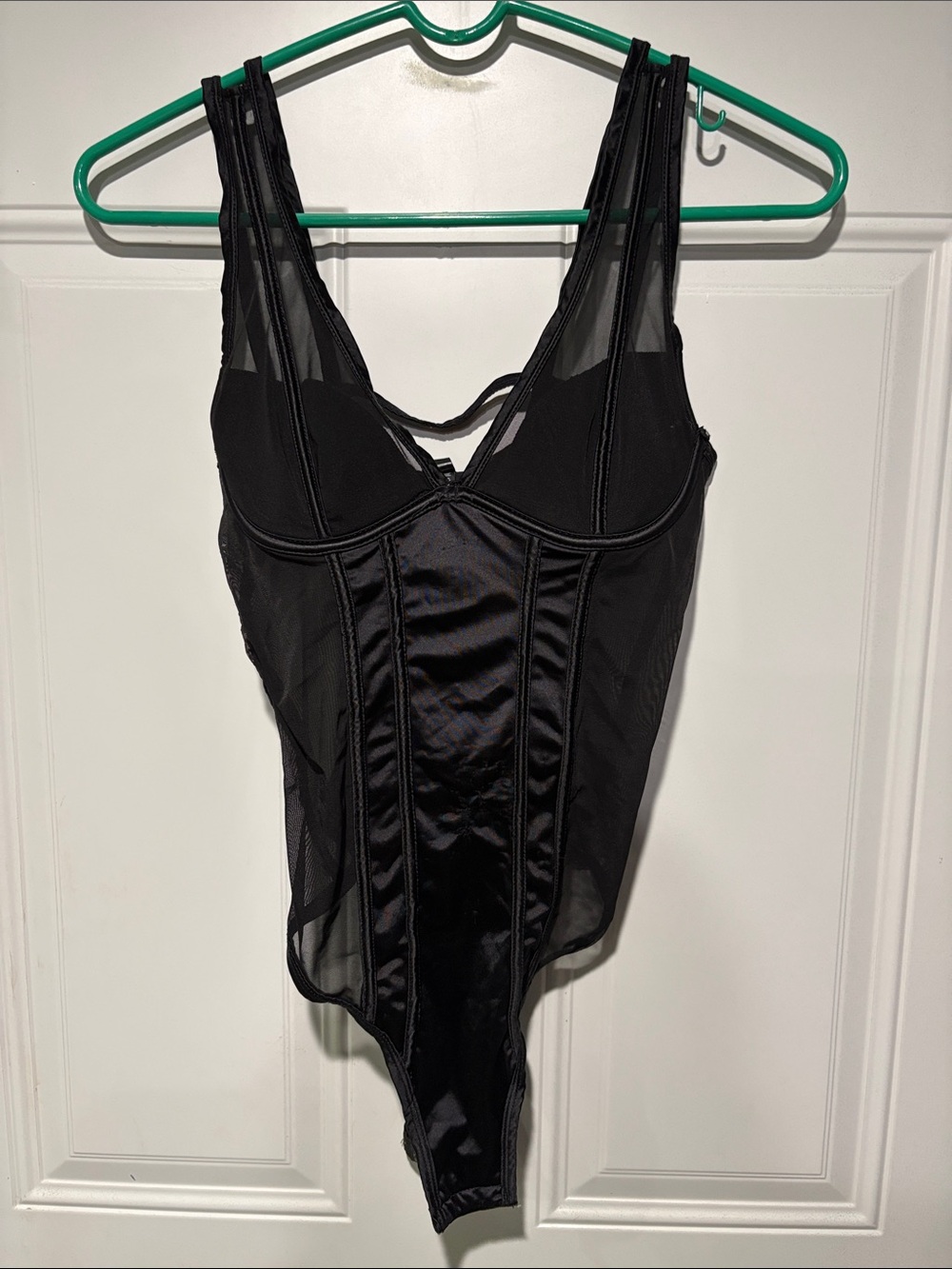Sleek Black Bodysuit with Sheer Side Panels